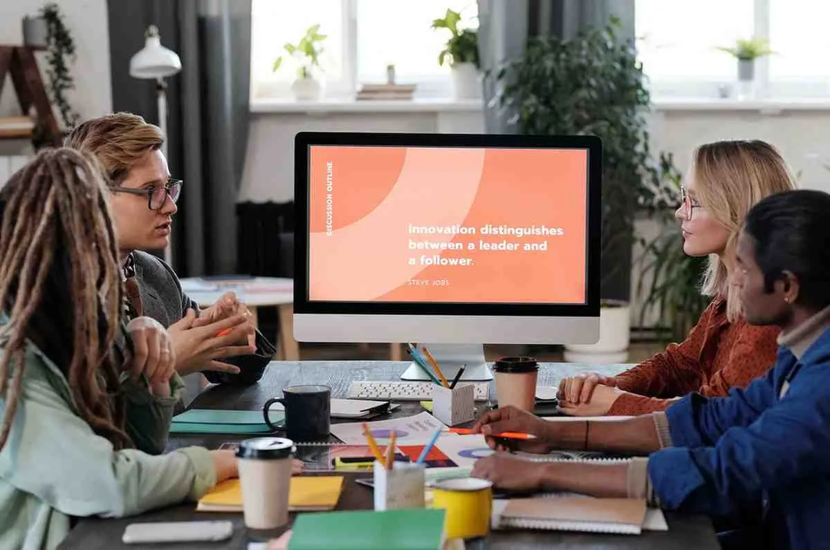 Galexy IT Solution professionals sharing thoughts around a system setup